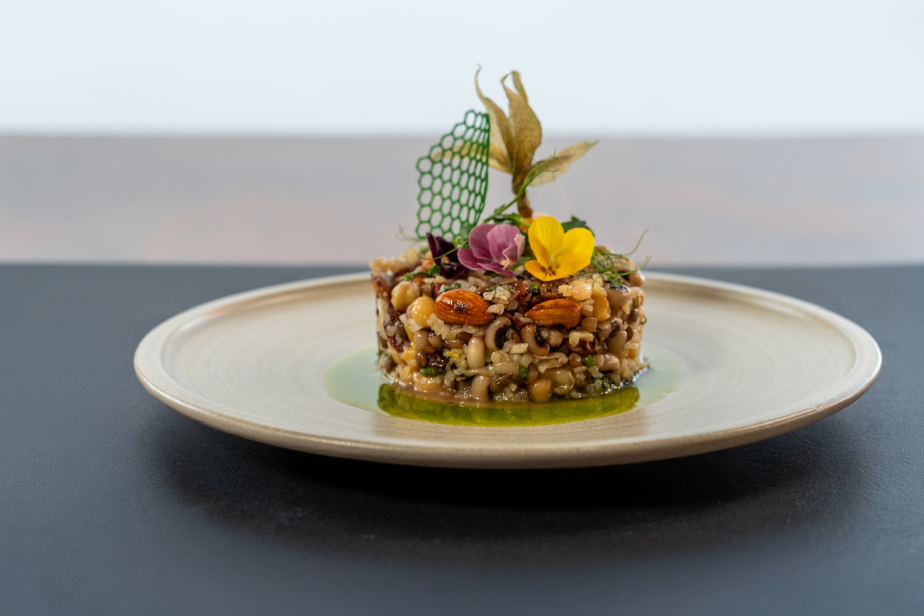 Black-eyed bean tartare with edible flowers
