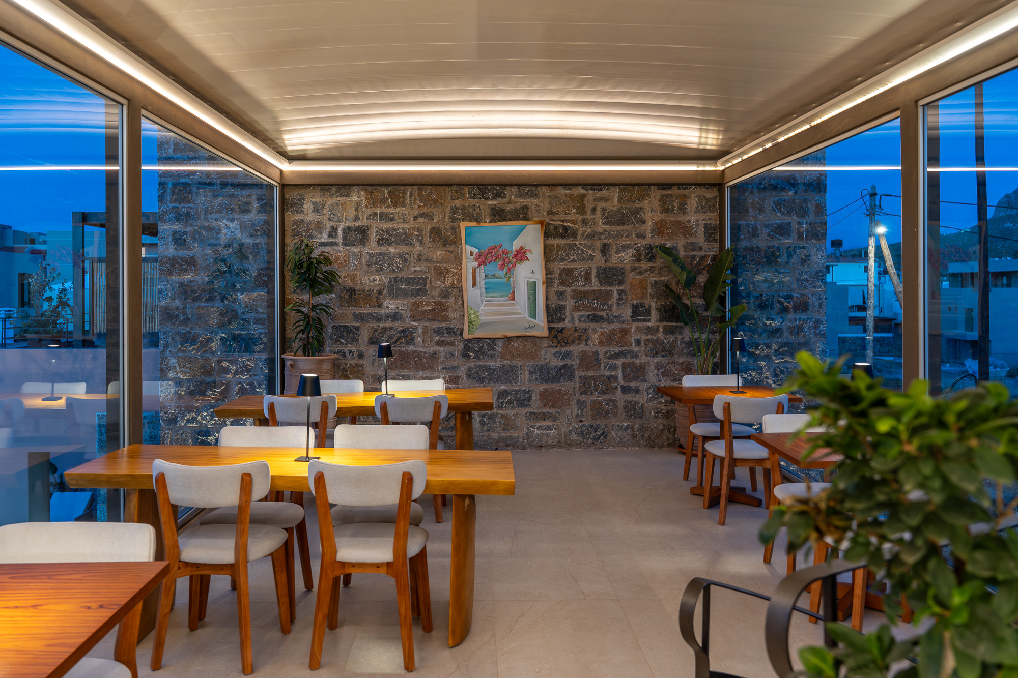 Indoor dining with stone walls