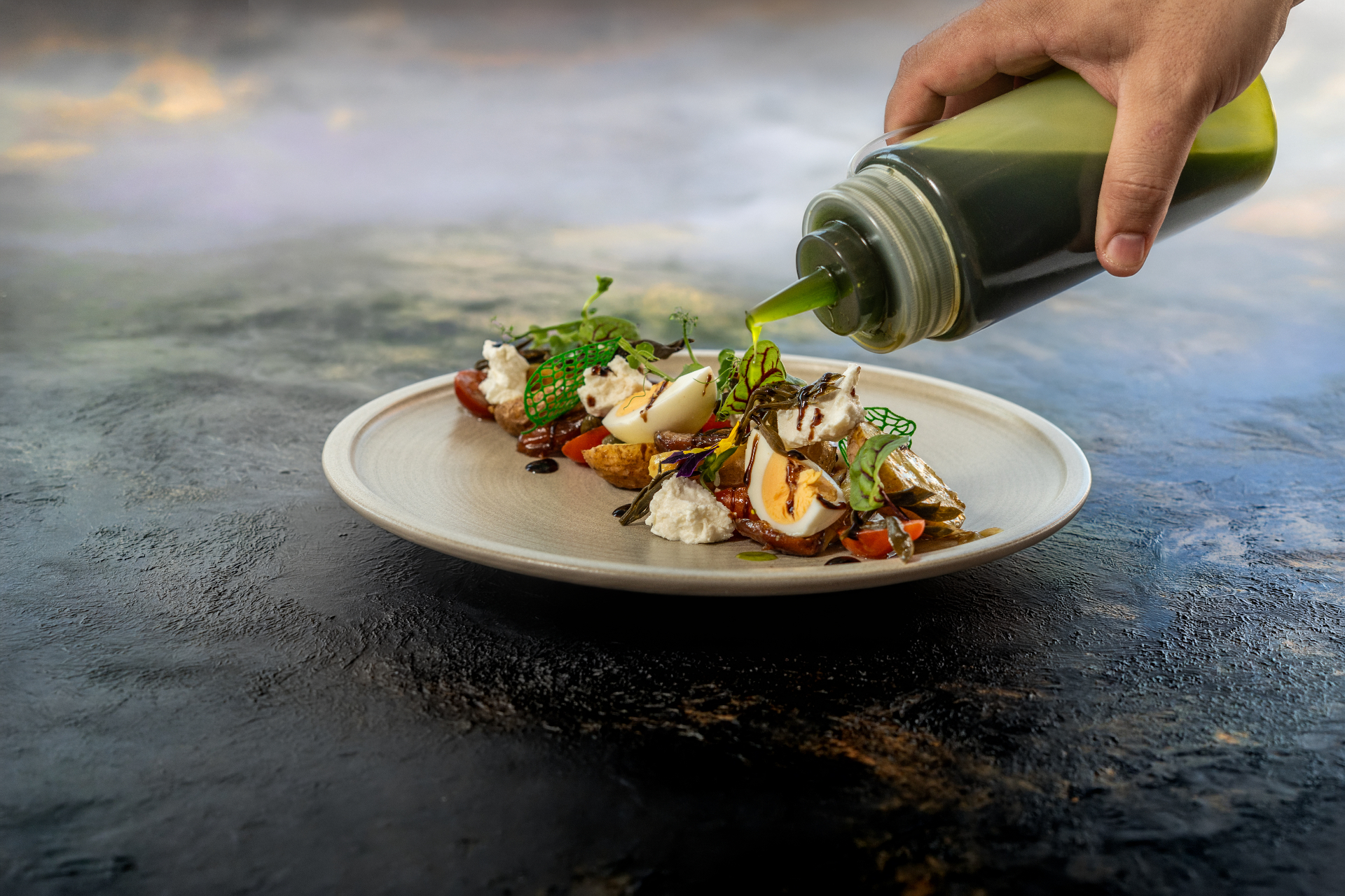 Olive oil poured over salad