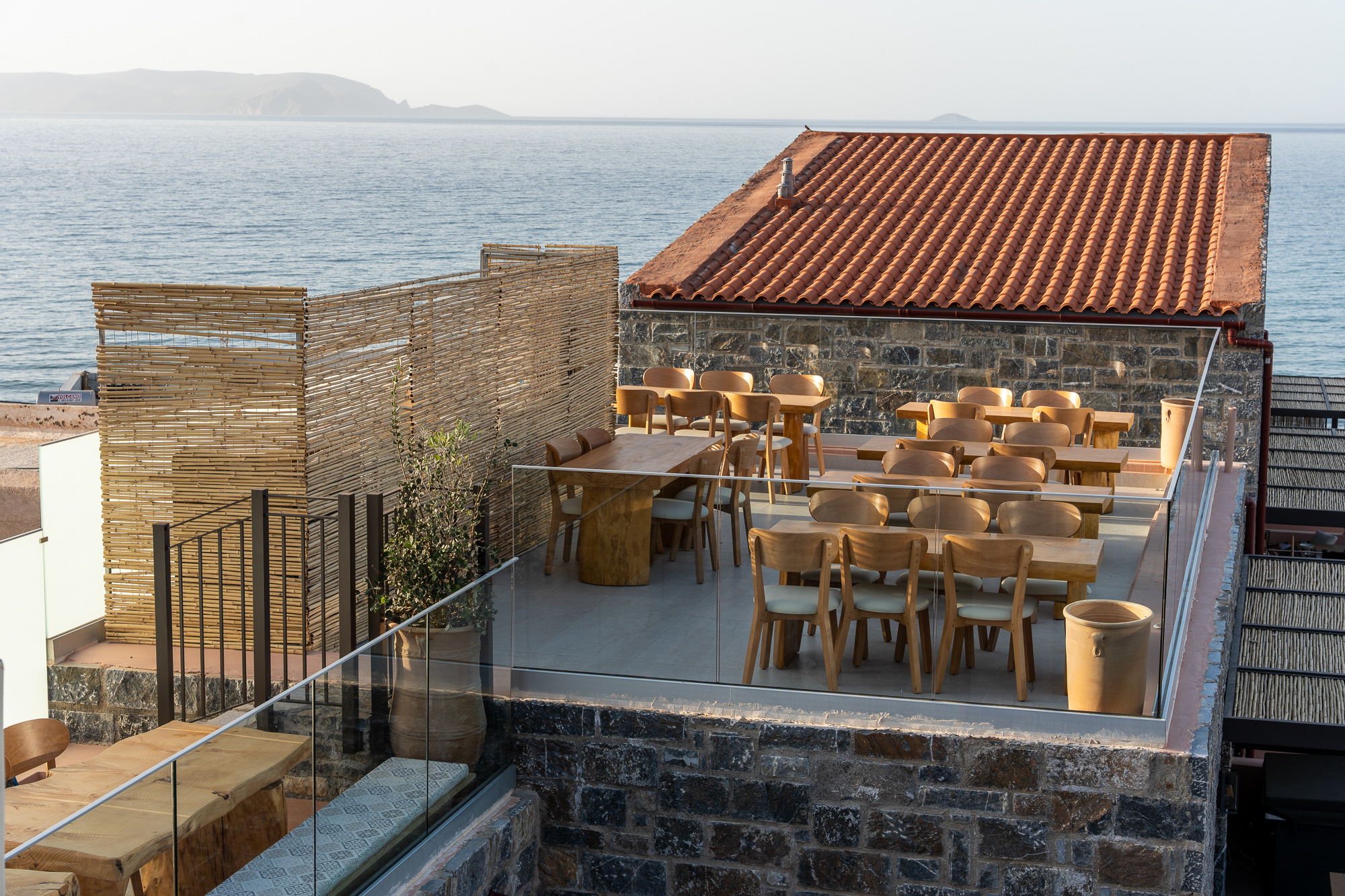 Rooftop tables overlooking the sea