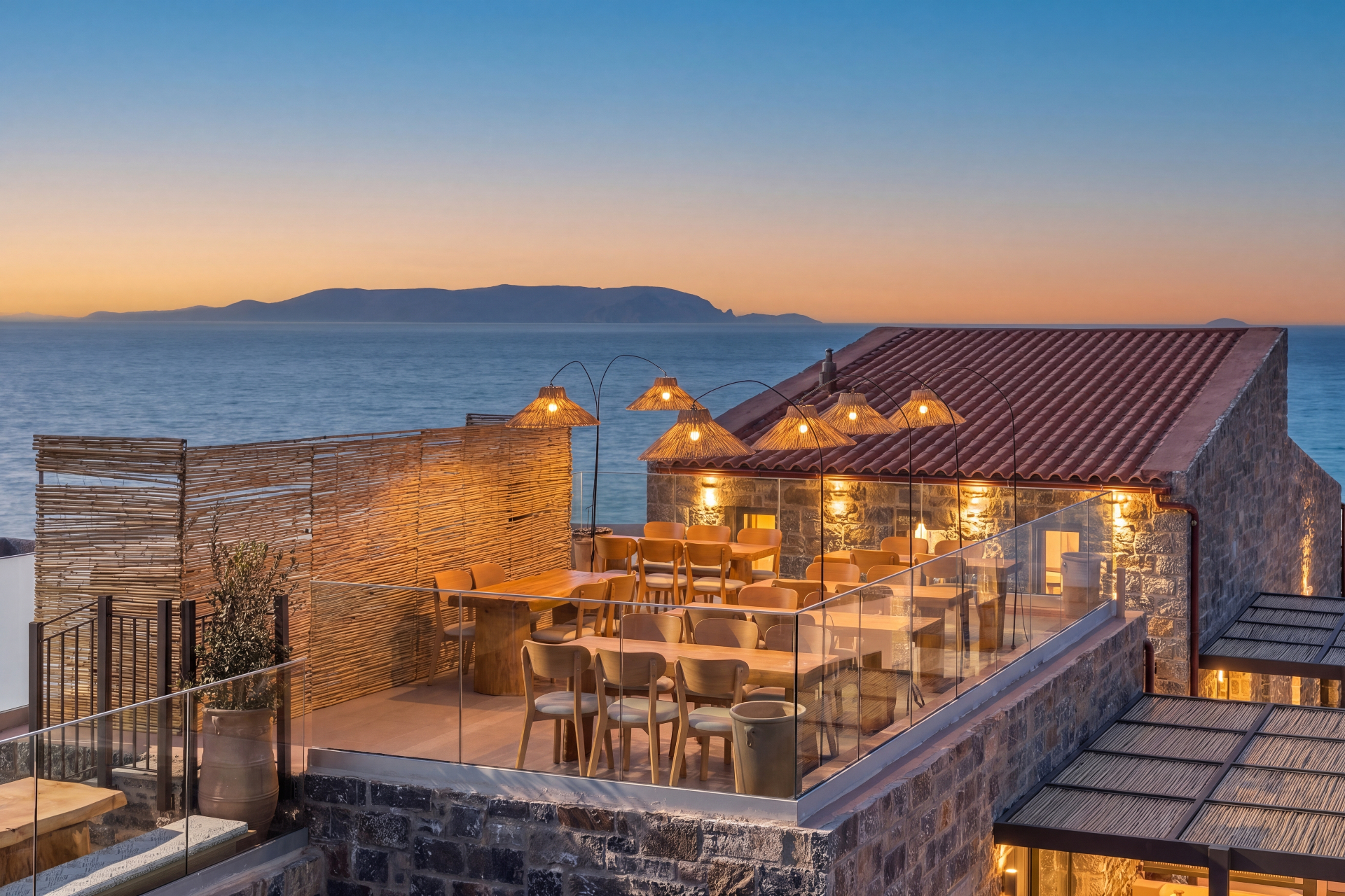 Rooftop terrace at twilight with sea view